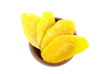 Dried mango slices in wooden bowl isolated on white background, top view. Candied mango fruits