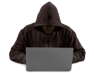 Undefined hacker using computer wearing dark hoodie isolated on white