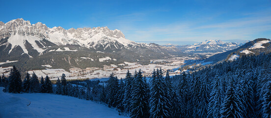 Fototapeta na wymiar winter landscape Wilder Kaiser mountains, view to Ellmau tourist resort