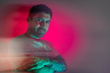 young man dances with the lights