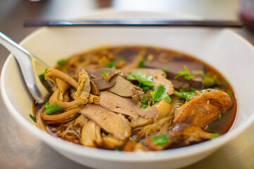 Top view Duck noodle on a white bowl,One of the menu of Thai street street noodles