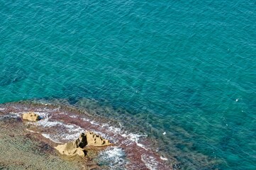 Aerial view of the Mediterranean sea from the rocky shore