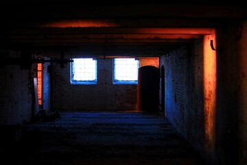 Fototapeta na wymiar Grungy corridor with unusual daylight in blue and orange