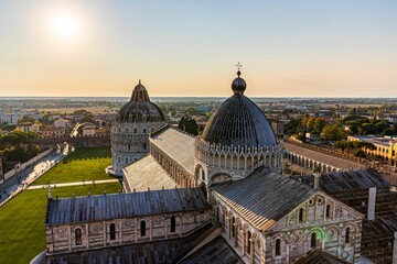 Fototapeta na wymiar Cathedral and baptistery of Piazza dei Miracoli the city of Pisa, Tuscany, Italy