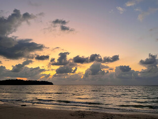 Fototapeta na wymiar Stunning golden sunset view over sea ocean landscape on Bang Tao beach on Phuket island, Thailand