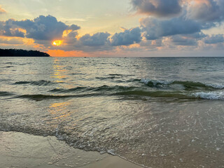 Stunning golden sunset view over sea ocean landscape on Bang Tao beach on Phuket island, Thailand