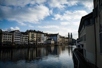 Beautiful shot of historic buildings across water in Zurich, Switzerland