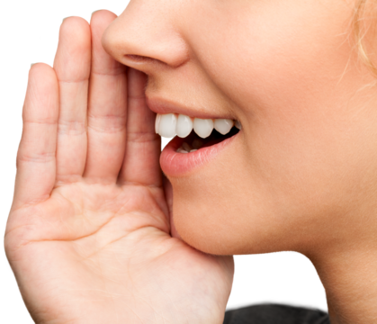 Close up portrait of a smiling skin care woman whispers (tells) a gossip.