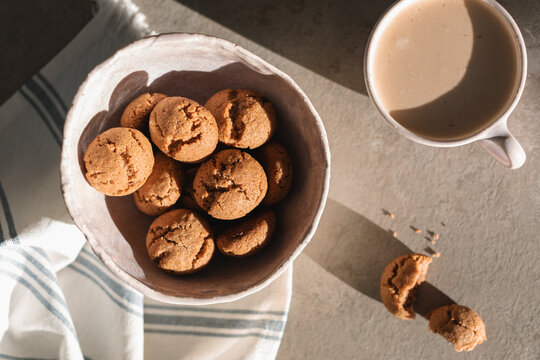 Almond sugar free cookies and coffee on table. Healthy dessert without flour. Low carb recipes.