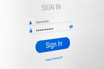 Verification window, username and password fields, password characters in the form of dots, text forgot password. Photo of a computer screen, selective focus.