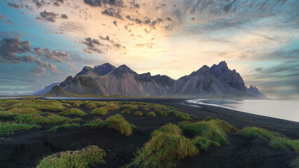 Stokksnes cape in Iceland during sunrise. Vestrahorn mountains. Amazing Iceland nature seascape.