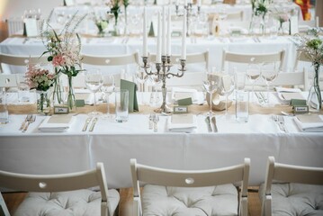 Closeup of wedding table with candles and special design