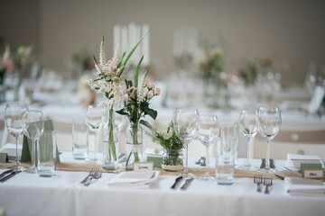 Closeup of wedding table with candles and special design
