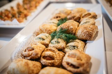 Closeup of puff pastry on a tray at a banquet