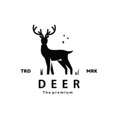 Deurstickers vintage retro hipster deer logo vector silhouette art © Artoniumw