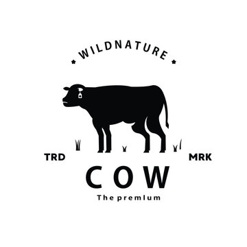 vintage retro hipster cow logo vector silhouette art icon for farm