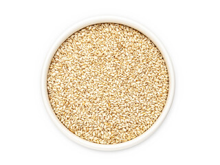 White sesame in a white bowl on a white background, isolate, close-up, top view. Flat lay.