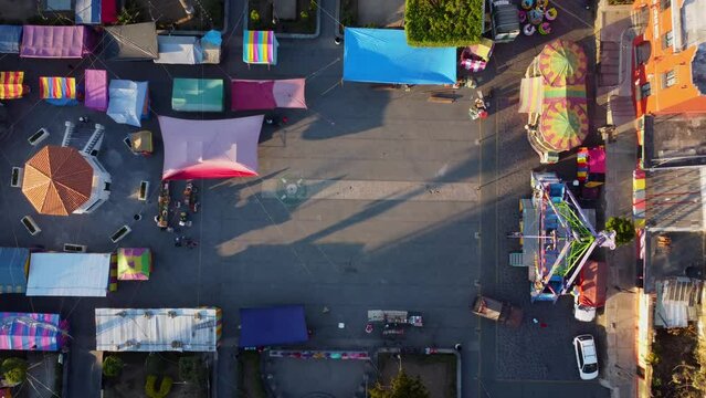 aerial view of zocalo and fair with mechanical games