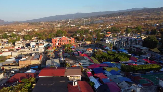 aerial view of zocalo and fair with mechanical games