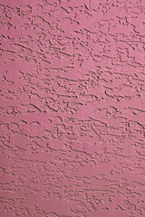 Front view of deep orchid purple colored abstract pattern concrete wall