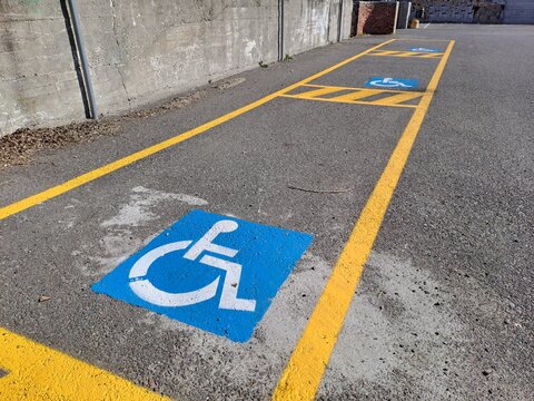 Handicap parking lot, Designated parking for people with disabilities. Number three handicapped parking.