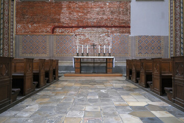 Monumental church building in Gothic in neo-romanesque arch style with large ceiling and altar...