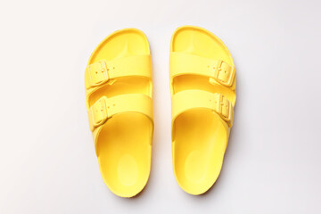 Yellow Summer Slippers, Rubber Slide Sandal on White Background, Top View, Flat Lay