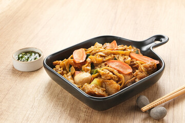 Kwetiaw or Kwetiau, fried rice noodles with meatballs and vegetables. Popular in Indonesia
