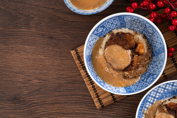 Migao, tube rice cake, rice pudding in a bowl, delicious Taiwanese street food.