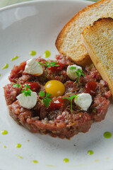tartare with cheese and croutons