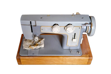 Electric sewing machine produced in the Soviet Union (USSR), isolated on a white background