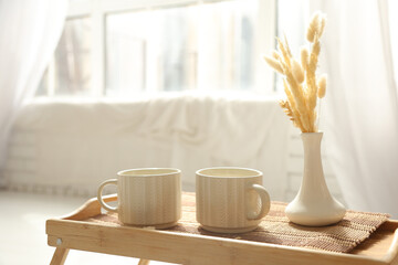 Breakfast Set Close Up In The Room. Cups On A Tray With Vase