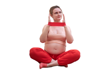 Playing sports during pregnancy with an elastic band, isolated on a white background. Pregnant woman does fitness workout in home kitchen