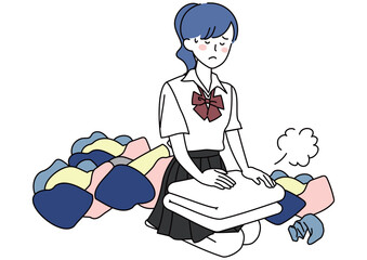 たくさんの洗濯物にうんざりする女子高校生