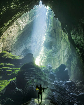 View of a couple in Hang Son Doong Cave, Quang Binh, Vietnam.
