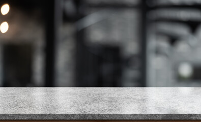 Empty white marble stone table top and blur interior cafe and restaurant.	
