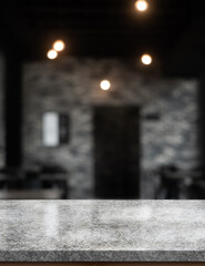 Empty white marble stone table top and blur interior cafe and restaurant.	