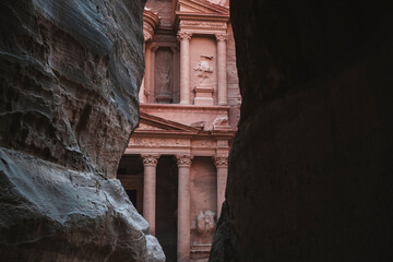 Petra Treasury (El Khazneh) partially hidden, reveals itself at the end of the Siq canyon, Petra, UNESCO World Heritage Site, Jordan, Middle East