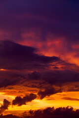 Colorful sunset sky with dark clouds, natural background