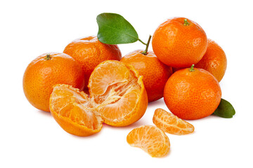 small tangerines or small oranges with leaves on white background.