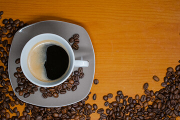 Morning coffee with coffee beans in the picture