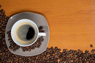 Morning coffee with coffee beans in the picture