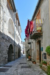 A narrow street among the old houses of Civitacampomarano, a historic town in the state of Molise...