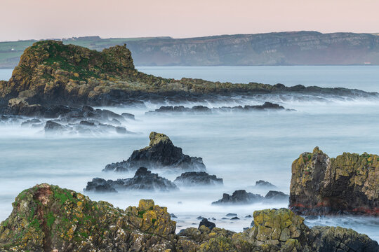 Rocky outcrops near Ballintoy Harbour on the Causeway Coast, County Antrim, Ulster, Northern Ireland