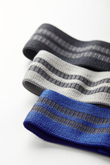 Textile elastic bands for fitness and sports on white background