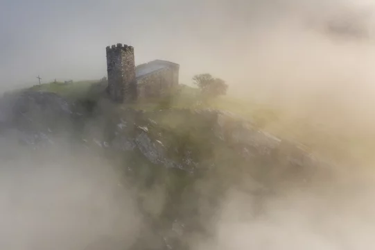 St. Michael de Rupe Church on the summit of Brentor on a misty September morning, Dartmoor, Devon