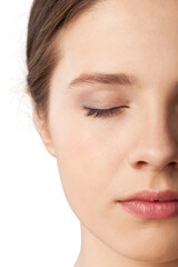Obraz premium Close up portrait of pretty young woman with eye closed on a white background