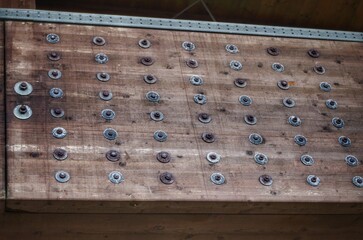 Detail of a beam with bolts, in an indoor swimming pool, in a sports centre.