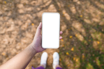 .Close up of women's hands holding cell telephone blank copy space screen. smart phone with technology concept