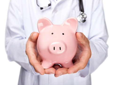 Doctor with Stethoscope Holding Piggy Bank close up
